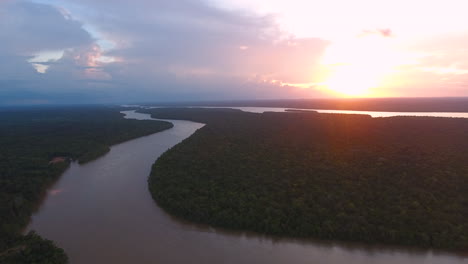Flying-over-Mana-river-Guiana-Suriname-during-sunset.-Amazonian-forest